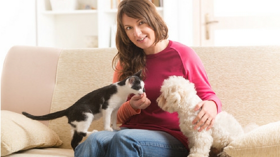 Pet Sitting in Sherman Oaks Woman Sitting With Dog and Cat